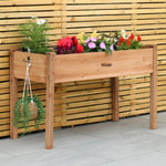 Woodside raised wooden garden bed planter with plants and vegetables, ideal for growing herbs and vegetables in a home garden.