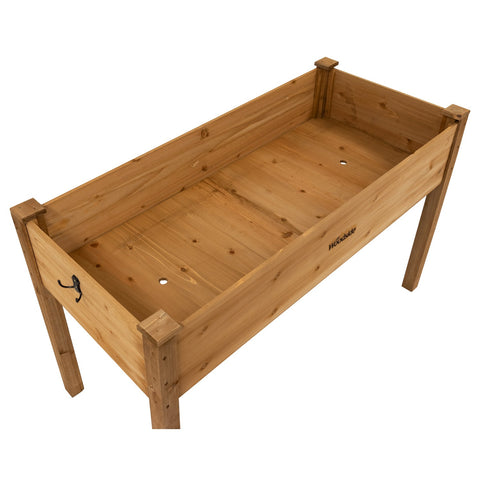 Woodside raised wooden garden bed planter with plants and vegetables, ideal for growing herbs and vegetables in a home garden.