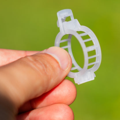 Pack of 200 Woodside tomato plant clips for garden trellis and cable support, ideal for securing plant stems.