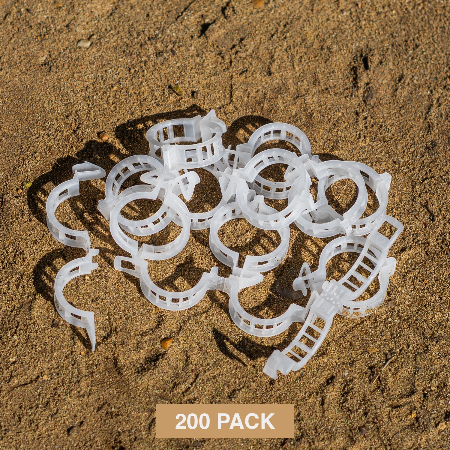 Pack of 200 Woodside tomato plant clips for garden trellis and cable support, ideal for securing plant stems.