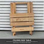 Wooden folding side table with 'Woodside' branding against a slatted wall background.