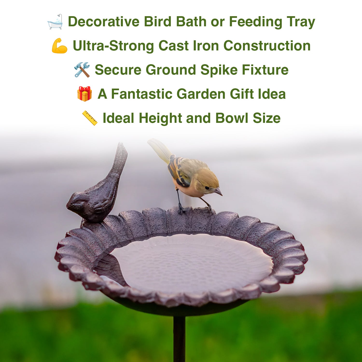 Decorative bird bath with birds on a blurred garden background