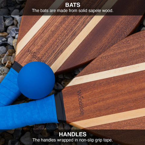 Wooden bats with blue handles on a gravel surface, featuring text about material and design.