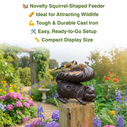 Squirrel-shaped bird feeder with a bird on top in a garden setting